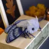 Blue moth plush toy for imaginative play
