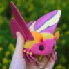 Rosy Maple Moth Doll – pink and yellow plush insect with wide wings and fuzzy faux fur body