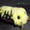 A bright yellow body of Spanish Moon Moth plush with brown polymer legs and feather antennae